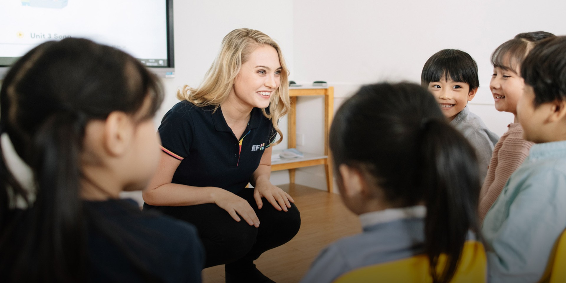 ESL teacher in the classroom with students