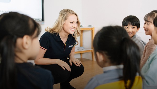 ESL teacher in the classroom with students